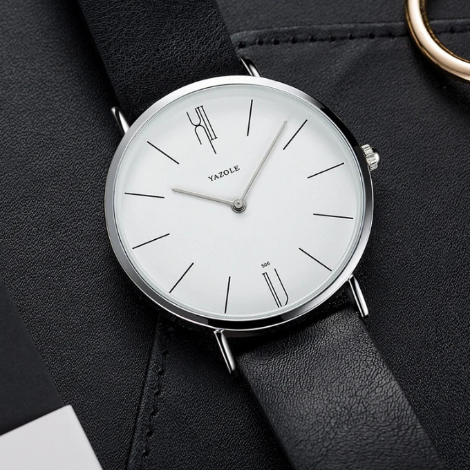 Sterlingsølv koskinnklokke