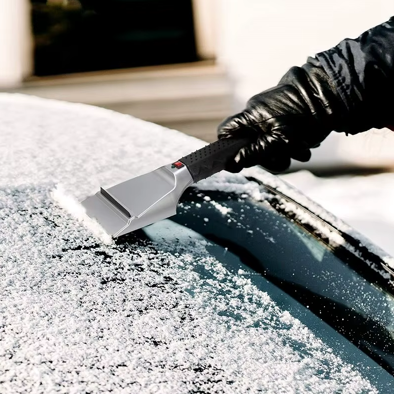 Oppvarmet snøskuffe